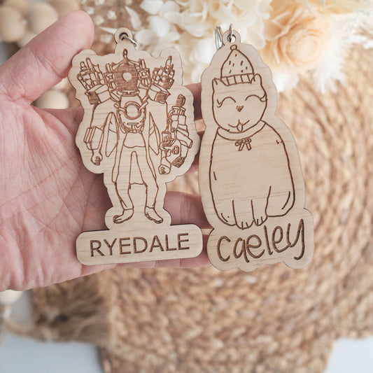 Close up photo of our personalised school bag tag for kids featuring their own drawing and handwriting