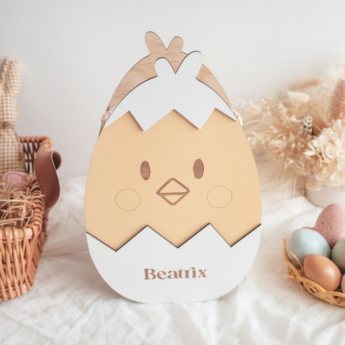 Wooden Easter Chick basket to store all the Easter goodies during the Easter hunt. Front showing a bit of the back