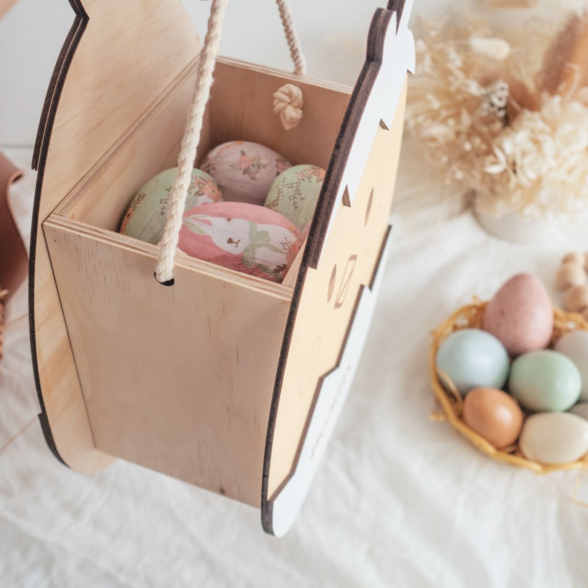 Wooden Easter Chick basket to store all the Easter goodies during the Easter hunt. Angle showing the inside of the box
